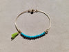 Turquoises bangles pompons