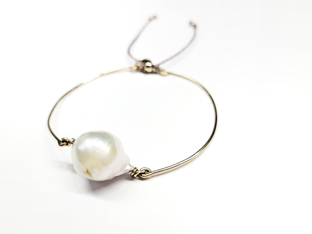 Baroque pearl bangle sliding ball